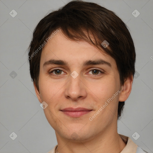 Joyful white young-adult male with short  brown hair and brown eyes