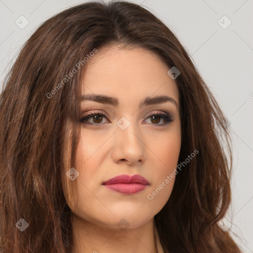 Neutral white young-adult female with long  brown hair and brown eyes