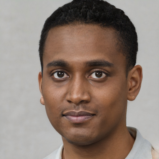 Neutral black young-adult male with short  black hair and brown eyes