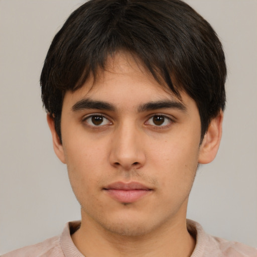 Neutral asian young-adult male with short  brown hair and brown eyes