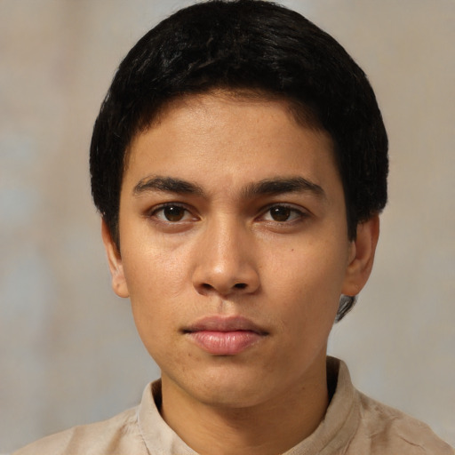 Neutral latino young-adult male with short  black hair and brown eyes