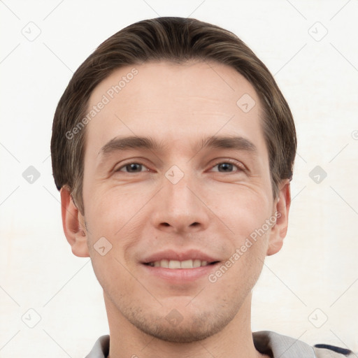 Joyful white young-adult male with short  brown hair and brown eyes