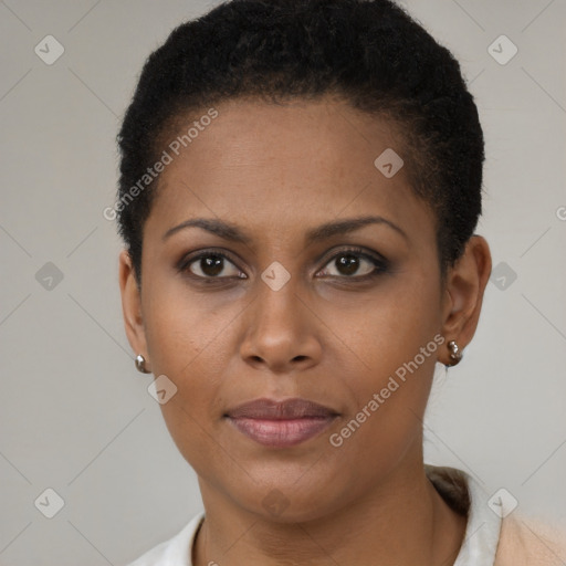 Joyful black young-adult female with short  brown hair and brown eyes