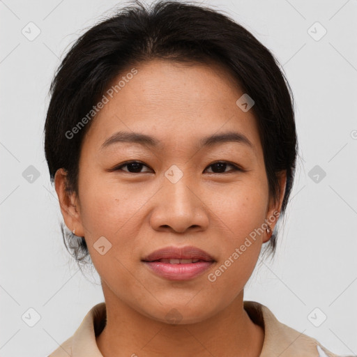 Joyful asian young-adult female with medium  brown hair and brown eyes