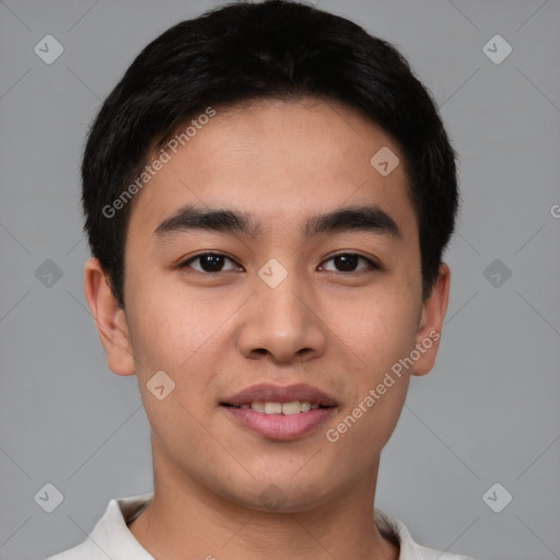 Joyful asian young-adult male with short  brown hair and brown eyes