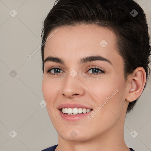 Joyful white young-adult female with short  brown hair and brown eyes