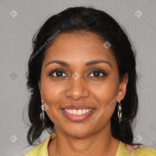 Joyful black young-adult female with medium  brown hair and brown eyes