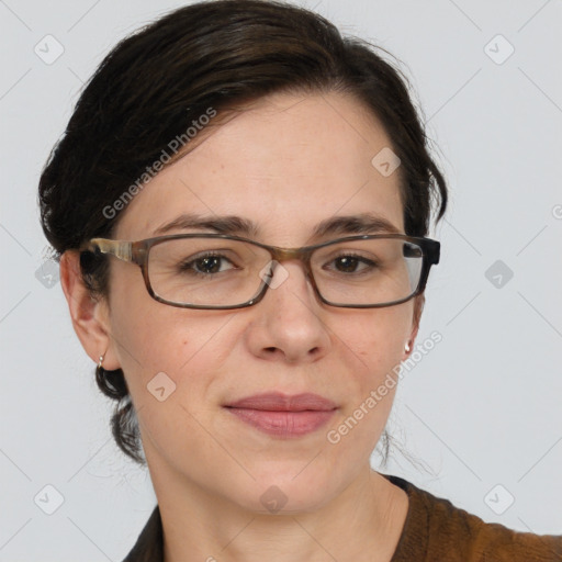 Joyful white adult female with medium  brown hair and brown eyes