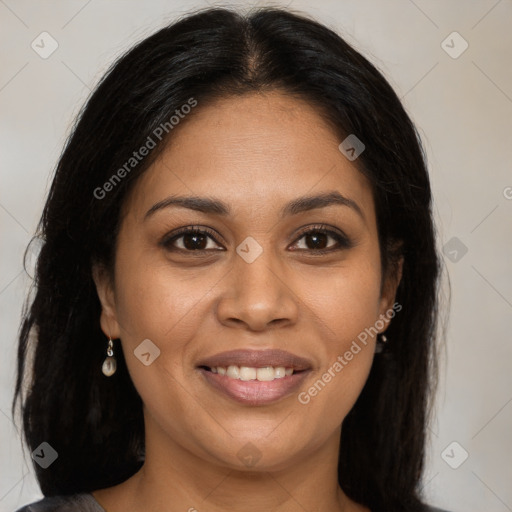 Joyful latino young-adult female with medium  brown hair and brown eyes