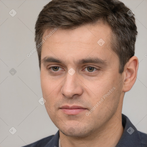 Neutral white young-adult male with short  brown hair and brown eyes