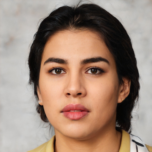 Neutral latino young-adult female with medium  black hair and brown eyes