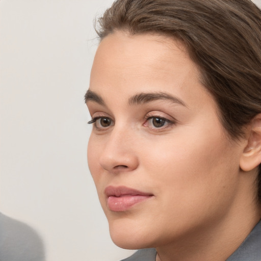 Neutral white young-adult female with short  brown hair and brown eyes