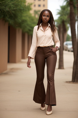 Senegalese young adult female with  brown hair