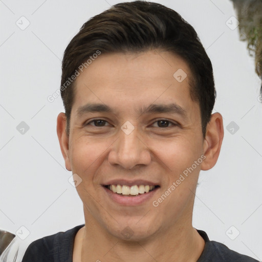 Joyful white young-adult male with short  black hair and brown eyes