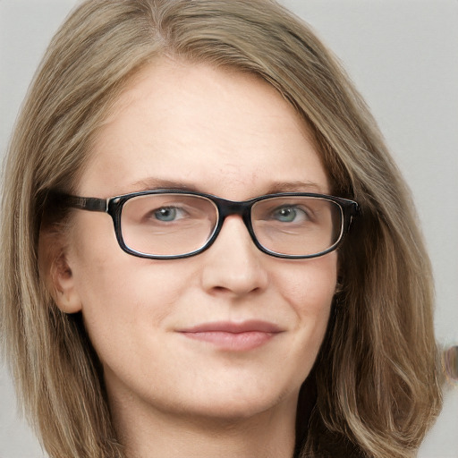 Joyful white young-adult female with long  brown hair and blue eyes