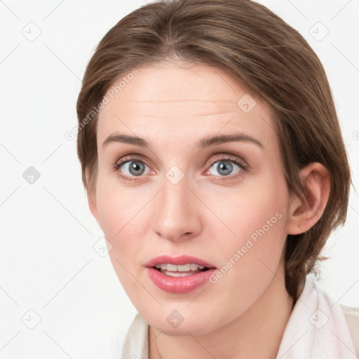 Joyful white young-adult female with medium  brown hair and blue eyes