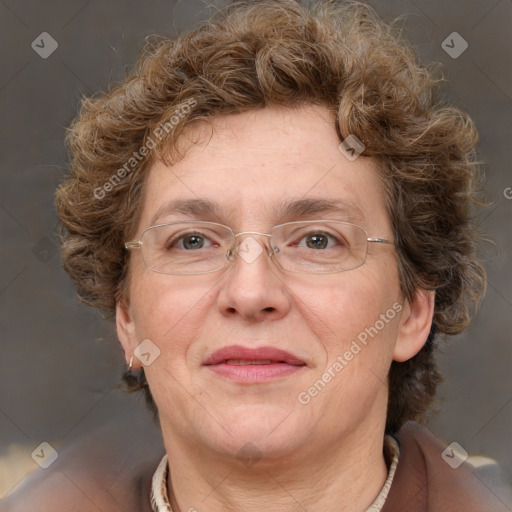 Joyful white adult female with medium  brown hair and blue eyes