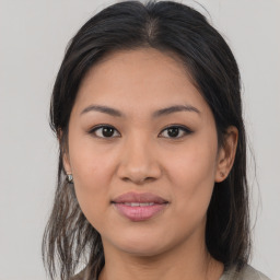 Joyful asian young-adult female with medium  brown hair and brown eyes