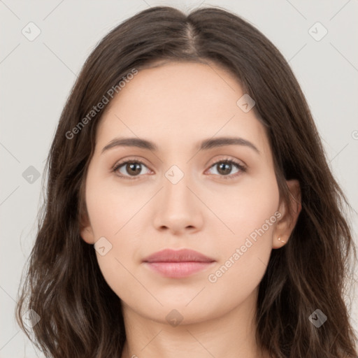 Neutral white young-adult female with long  brown hair and brown eyes