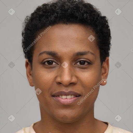 Joyful black young-adult female with short  black hair and brown eyes