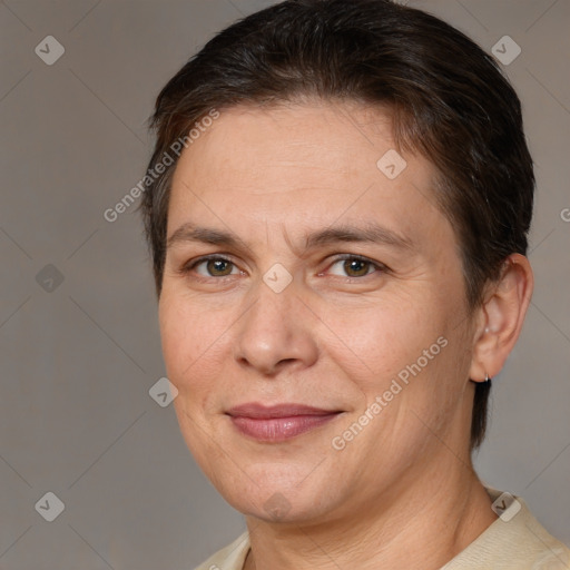 Joyful white adult female with short  brown hair and brown eyes