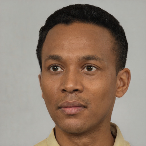 Neutral black young-adult male with short  black hair and brown eyes