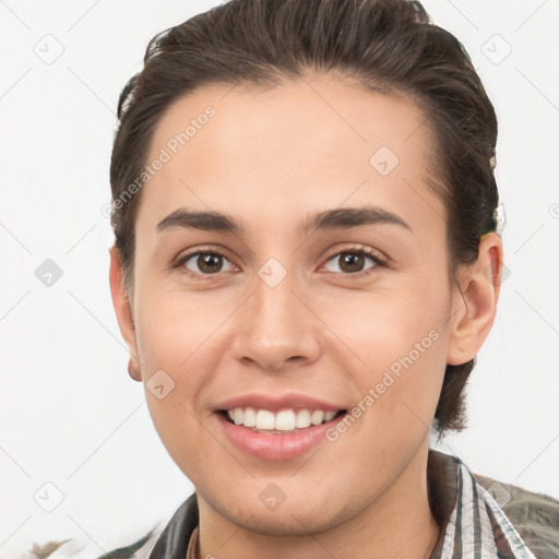 Joyful white young-adult female with short  brown hair and brown eyes