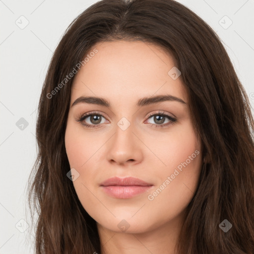 Neutral white young-adult female with long  brown hair and brown eyes