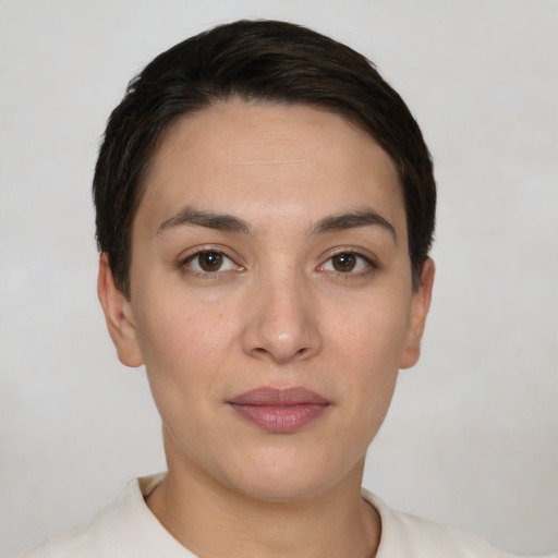 Neutral white young-adult female with short  black hair and brown eyes