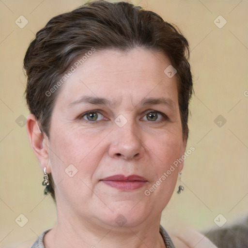 Joyful white adult female with short  brown hair and brown eyes