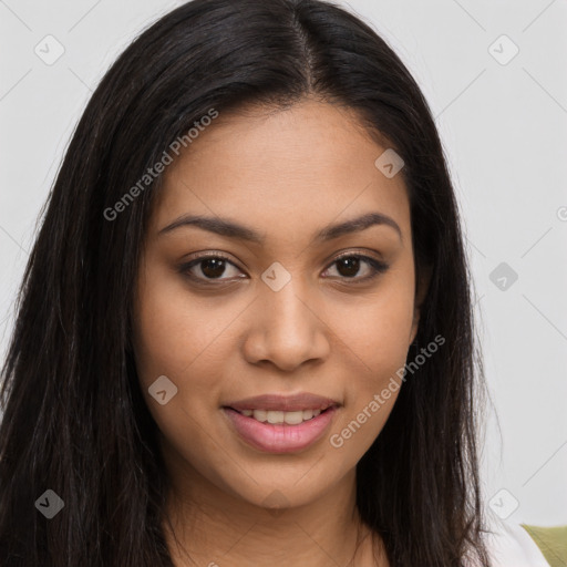 Joyful latino young-adult female with long  brown hair and brown eyes