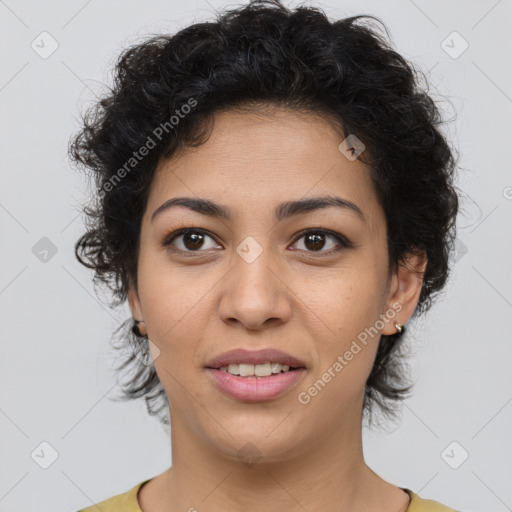 Joyful latino young-adult female with short  brown hair and brown eyes