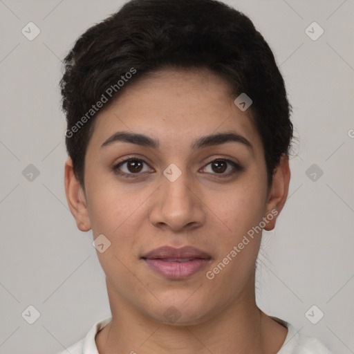 Joyful latino young-adult female with short  brown hair and brown eyes