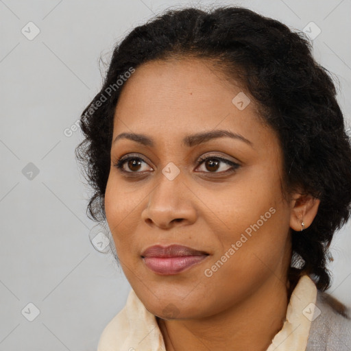 Joyful latino young-adult female with long  black hair and brown eyes