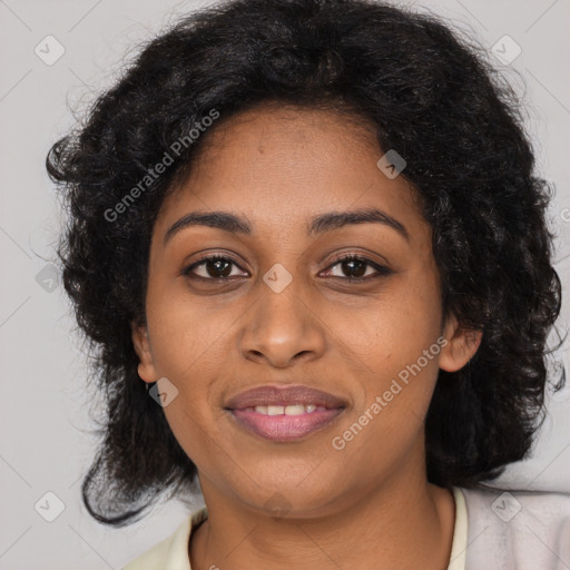 Joyful black young-adult female with medium  black hair and brown eyes