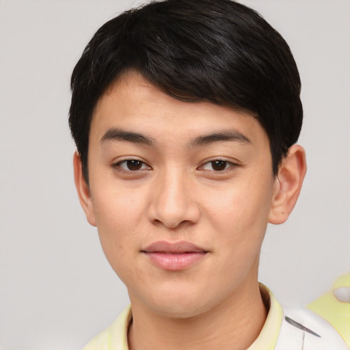 Joyful asian young-adult male with short  brown hair and brown eyes