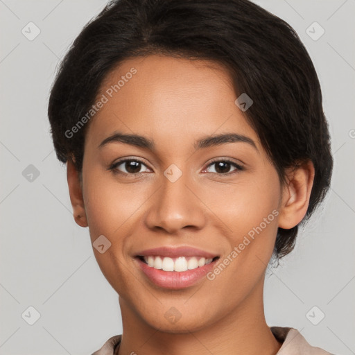 Joyful white young-adult female with short  black hair and brown eyes