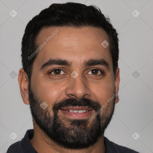 Joyful white young-adult male with short  black hair and brown eyes