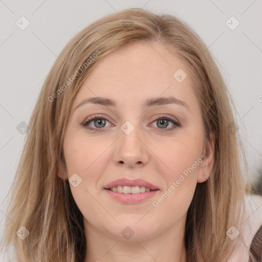 Joyful white young-adult female with long  brown hair and grey eyes