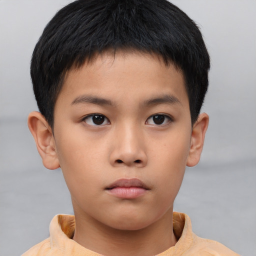 Neutral asian child male with short  brown hair and brown eyes