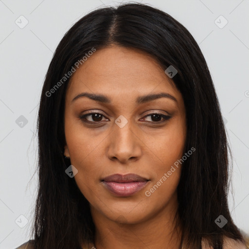 Joyful latino young-adult female with long  black hair and brown eyes