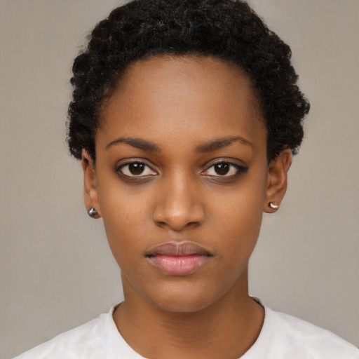 Neutral black young-adult female with short  black hair and brown eyes