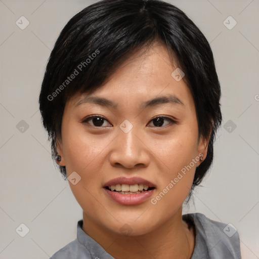 Joyful asian young-adult female with medium  black hair and brown eyes