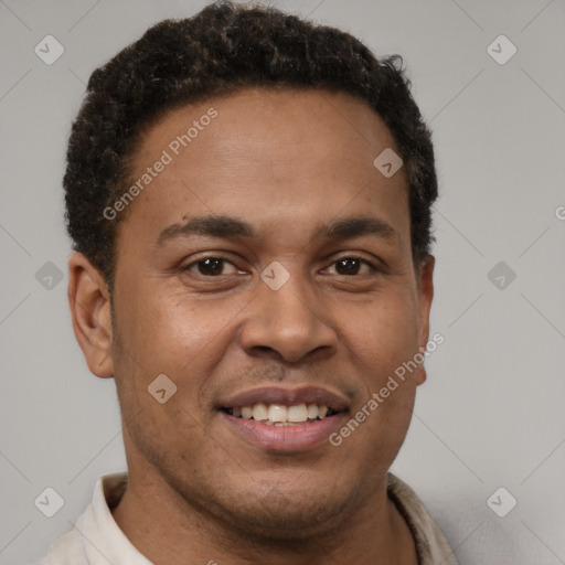Joyful latino young-adult male with short  brown hair and brown eyes