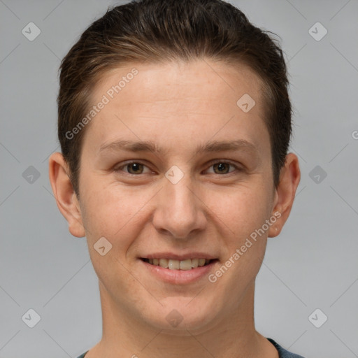 Joyful white adult female with short  brown hair and grey eyes