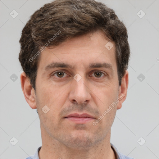 Neutral white adult male with short  brown hair and brown eyes