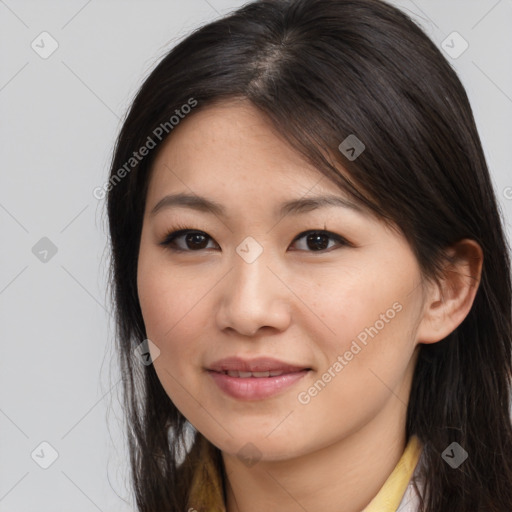 Joyful asian young-adult female with long  brown hair and brown eyes