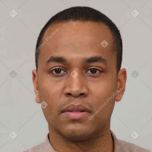 Neutral latino young-adult male with short  black hair and brown eyes
