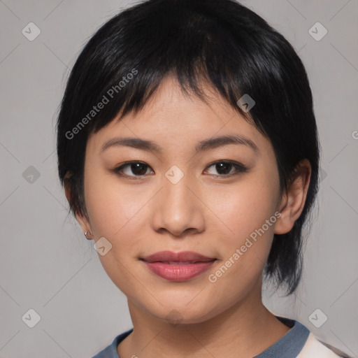 Joyful asian young-adult female with medium  black hair and brown eyes