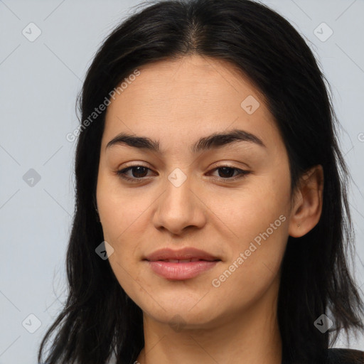 Joyful asian young-adult female with long  brown hair and brown eyes